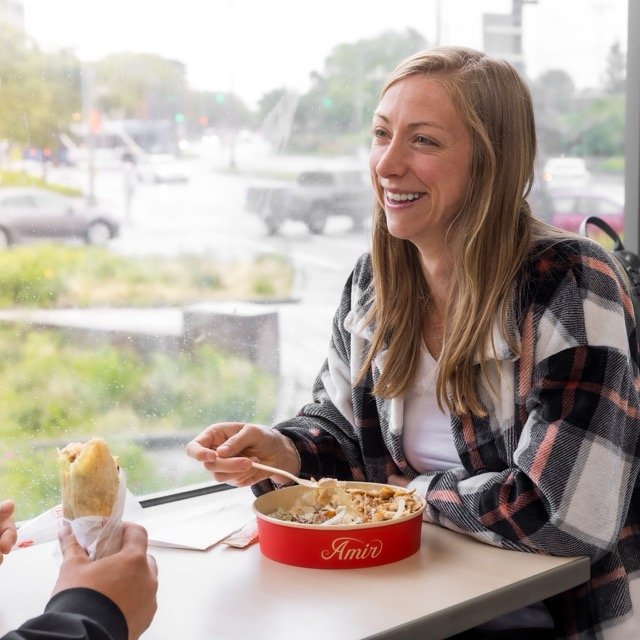 Amir food photography showing a platter of sandwiches.